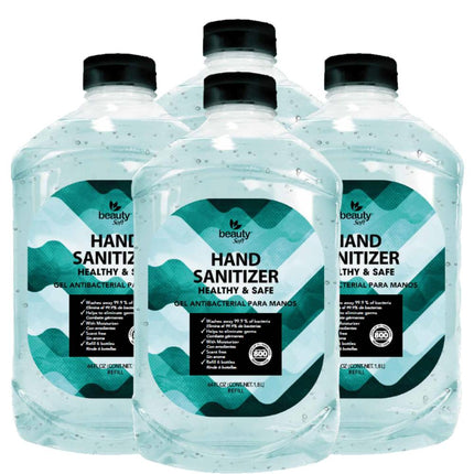 Four half-gallon hand sanitizer bottles with teal and white labels on a white background
